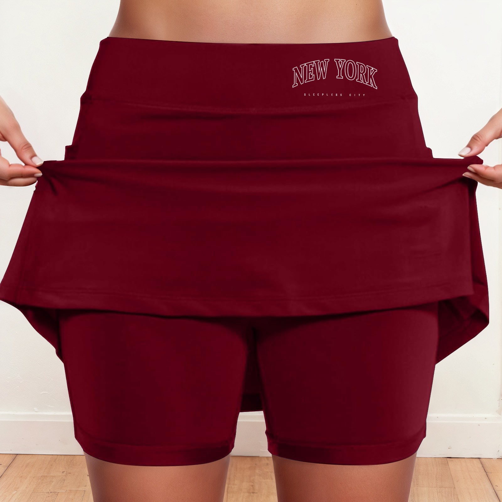 thumbnail image 2 of Falda culotte de talle medio para mujer: cintura elástica, bolsillos laterales, diseño fluido en capas, falda estampada informal para el verano., 2 of 6